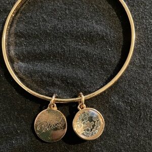 BCBGeneration Gold Tone 'Blessed' Charm Bangle Bracelet
